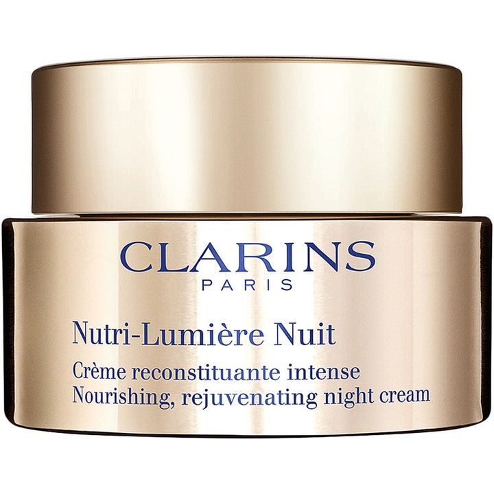 Clarins Nutri-Lumière Nuit 50 ml nærende nattkrem i en luksuriøs gullfarget krukke som gir huden fornyet glød.
