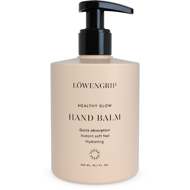 Löwengrip Healthy Glow Hand Balm 300 ml fuktighetsgivende håndkrem i beige flaske med svart pumpe som gir glød