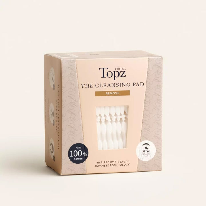 Topz Premium The Cleansing Pad 40 stk ansiktspleie i beige eske med vindu som viser hvite bomullspads