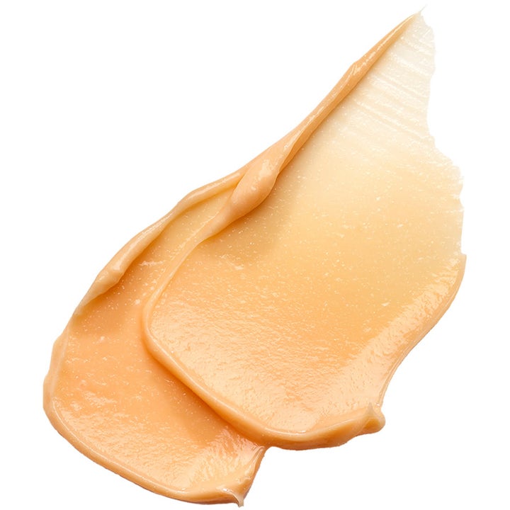 Exuviance Triple Microdermabrasion Face Polish 75 g ansiktsskrubb gir glød med ferskenfarget kornete tekstur