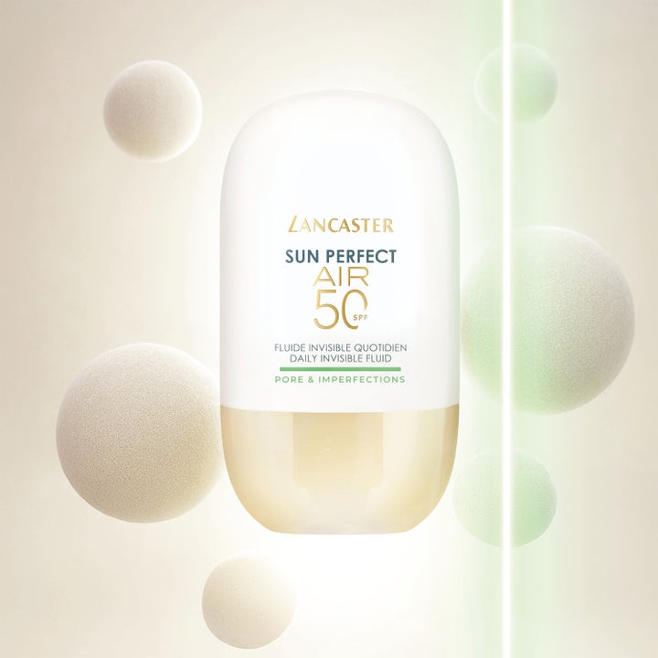Lancaster Sun Perfect AIR Fluid 40 ml solkrem for ansiktet med solfaktor 50 i hvit flaske med svevende kuler