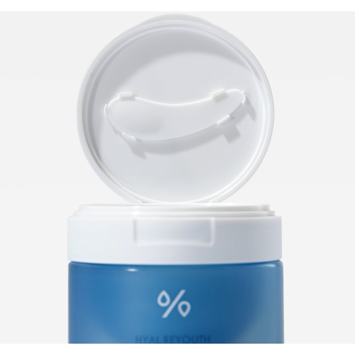 Dr. Ceuracle Hyal Reyouth Melting Foaming Balm 100 ml fuktighetsgivende ansiktsrens i blå krukke med hvit spatel i lokket