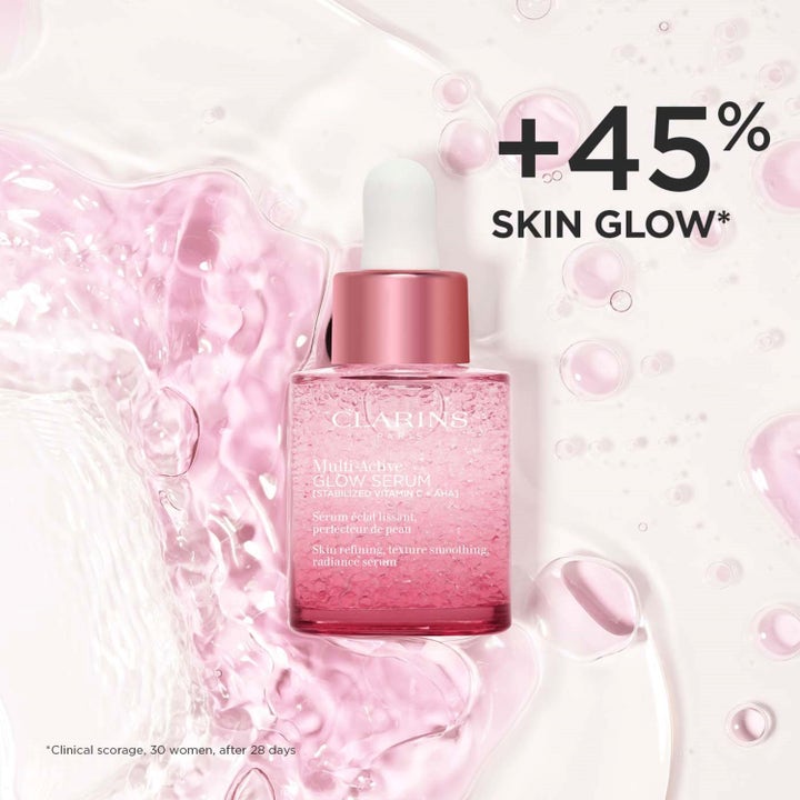 Clarins Multi-Active Glow Serum 30 ml glødgivende serum i rosa glassflaske med vannsprut og tekst om hudglød