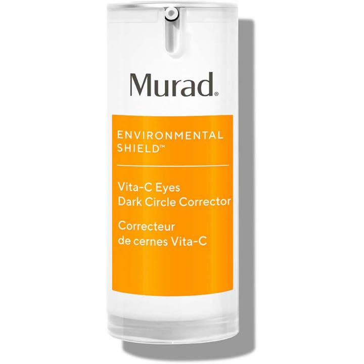 Murad Vita-C Eyes Dark Circle Corrector øyekrem som lysner mørke ringer i en hvit og oransje sylindrisk pumpeflaske.