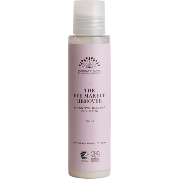 Rudolph Care The Eye Makeup Remover 100 ml øyesminkefjerner som gir pleie i en lys rosa flaske med hvit frostet kork