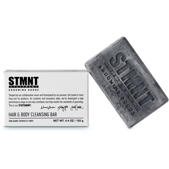 STMNT Grooming Goods Hair & Body Soapbar 125 g rensende såpestykke med grå marmorert tekstur og hvit eske