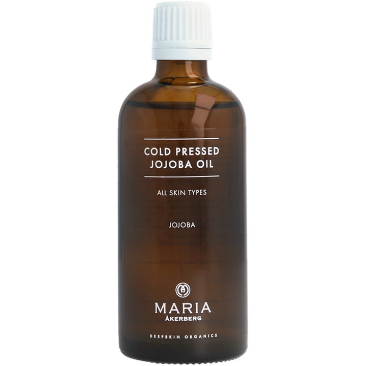 Maria Åkerberg Cold Pressed Jojoba Oil 100 ml pleiende ansiktsolje i mørk glassflaske med hvit kork