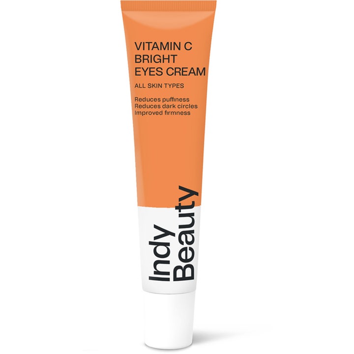 Indy Beauty Vitamin C Bright Eyes Cream 15 ml øyekrem mot mørke ringer i oransje og hvit tube med hvit kork