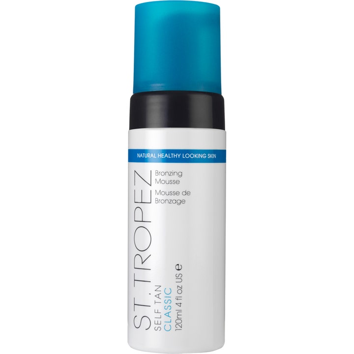 St. Tropez Self Tan Classic 120 ml selvbruningsmousse som gir glød i hvit flaske med blå kork.