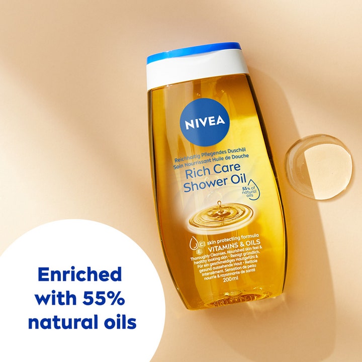 Nivea Rich Caring Shower Oil 200 ml nærende dusjolje med 55 % naturlige oljer og en gyllen teksturdrope.