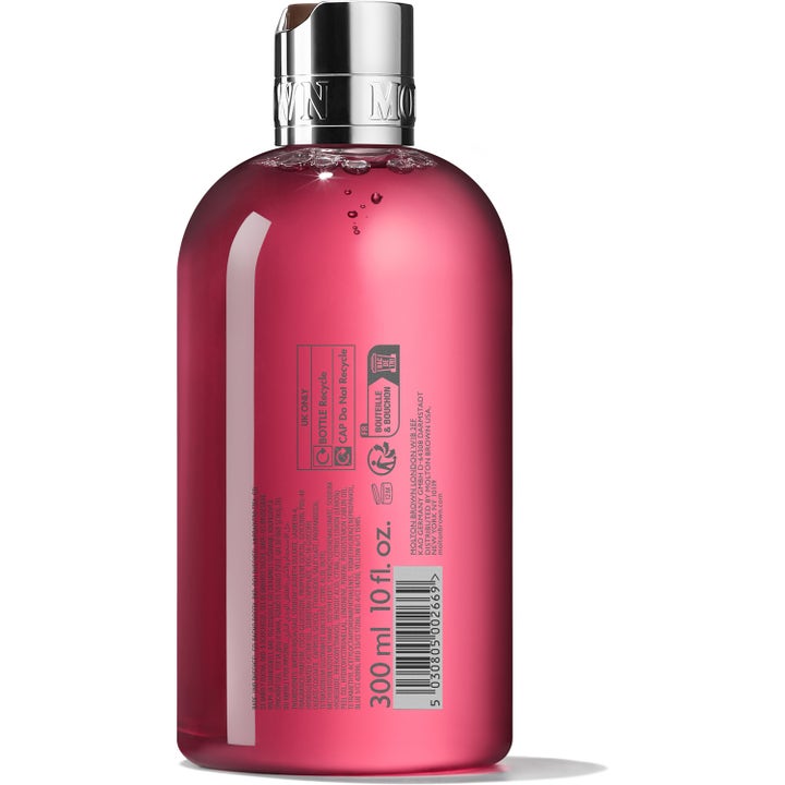 Molton Brown Fiery Pink Pepper 300 ml dusjsåpe i gjennomsiktig flaske som viser den rosa geleen fra baksiden