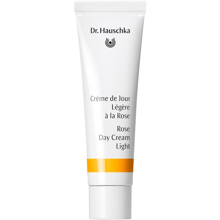 Dr. Hauschka Rose Day Cream Light 30ml beroligende ansiktskrem i hvit tube med oransje stripe og hvitt lokk