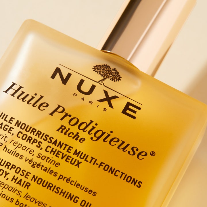Nuxe Huile Prodigieuse Riche 100 ml nærende kroppsolje i gyllen glassflaske med luksuriøs gullkork