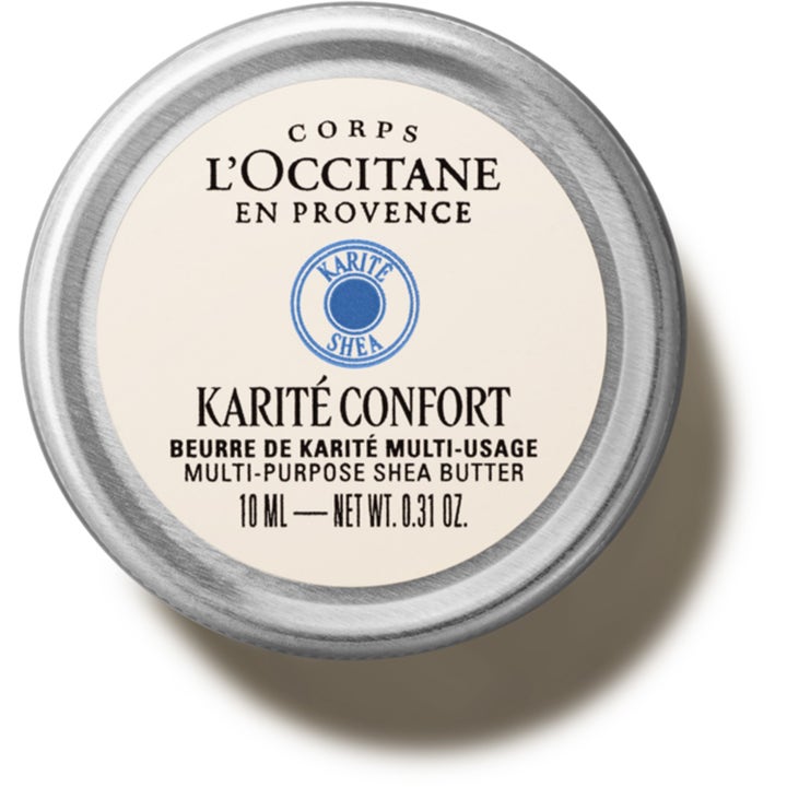 L'Occitane Karité Confort Multi-purpose Shea Butter 10 ml pleiende sheasmør i en rund metallboks med hvit etikett.