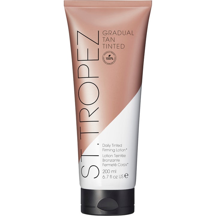 St. Tropez Gradual Tan Tinted Daily Firming Lotion 200 ml oppstrammende selvbruning i hvit og bronsefarget tube.