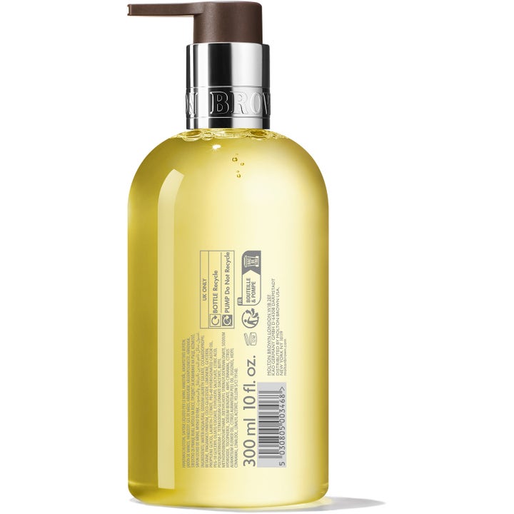 Molton Brown Orange & Bergamot 300 ml flytende håndsåpe i gjennomsiktig flaske sett fra baksiden med ingrediensliste.