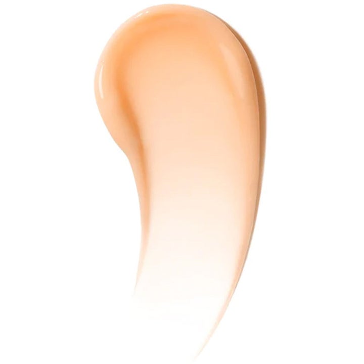 Ole Henriksen Vitamin C Boost hudpleie viser en kremet ferskenfarget tekstur med glødgivende vitamin C