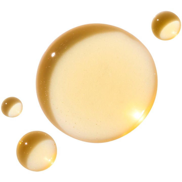 Ole Henriksen Balance Detox Drops 2% Salicylic Acid Toner 120 ml i form av klare gylne dråper med flytende tekstur.
