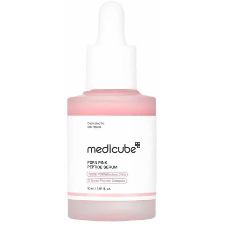 Medicube PDRN Pink Peptide Serum 30 ml gjenoppbyggende ansiktsserum med rosa væske i frostet glassflaske med hvit pipette