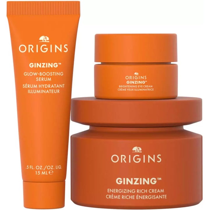 Origins GinZing Gift Set 70 ml hudpleie med oransje serumtube, øyekrem og ansiktskrem som gir glød