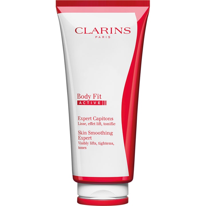 Clarins Body Fit Active oppstrammende kroppskrem i hvit plasttube med røde detaljer som gir en jevnere hud