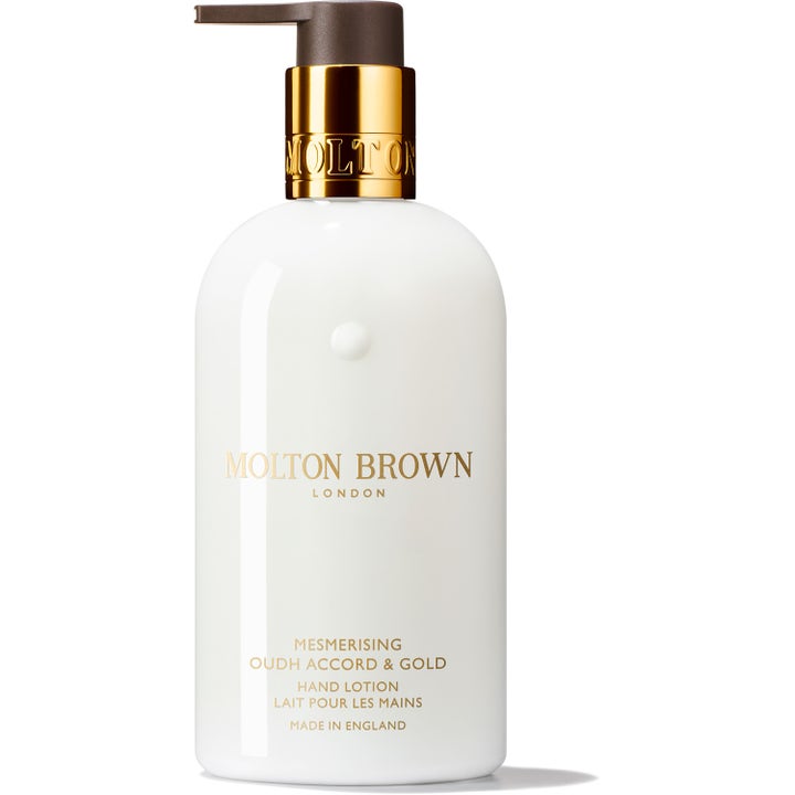 Molton Brown Mesmerising Oudh Accord &amp; Gold 300 ml fuktighetsgivende håndlotion i hvit pumpeflaske med gulldetaljer