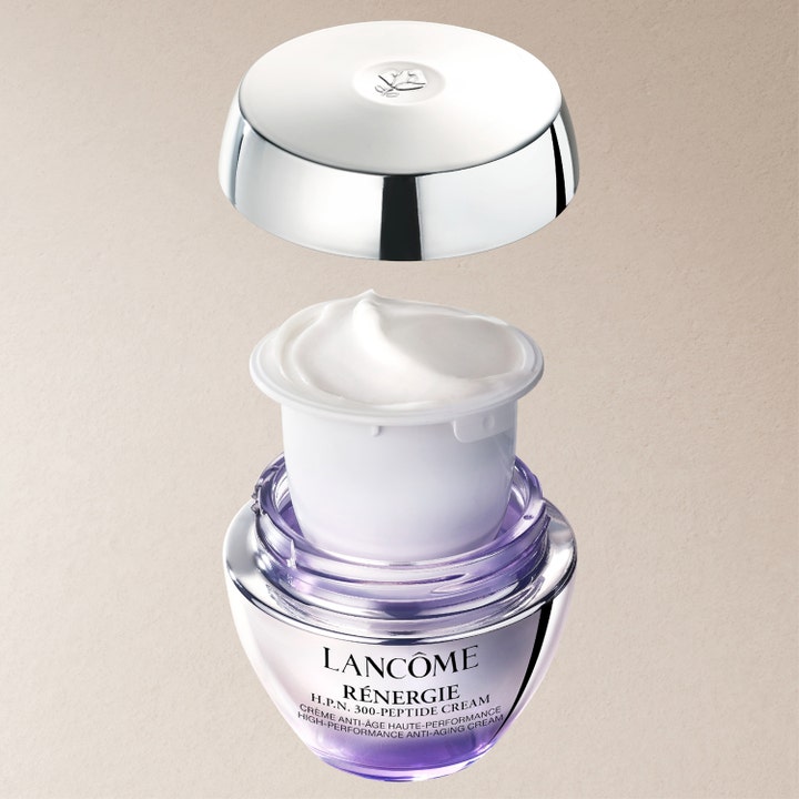 Lancôme Rénergie H.P.N. UVMUNE Cream 50 ml anti-age dagkrem med hvit tekstur i refill og lilla krukke med sølvlokk