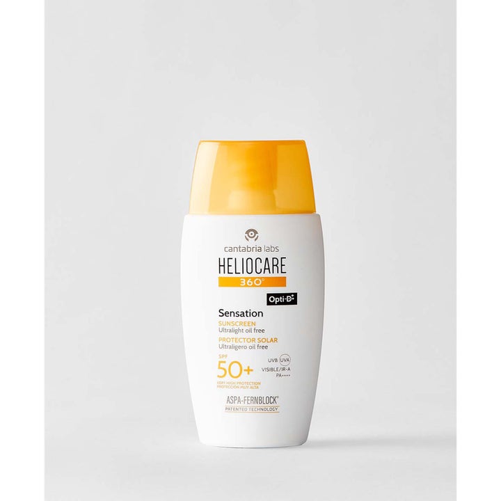 Heliocare Sensation SPF 50+ 50 ml solkrem ansikt gir ultralett solbeskyttelse i hvit plastflaske med oransje kork.