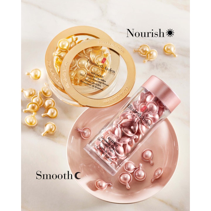 Elizabeth Arden Advanced Ceramide 60 kapsler serum med gylne og rosa kapsler på et fat som gir glød