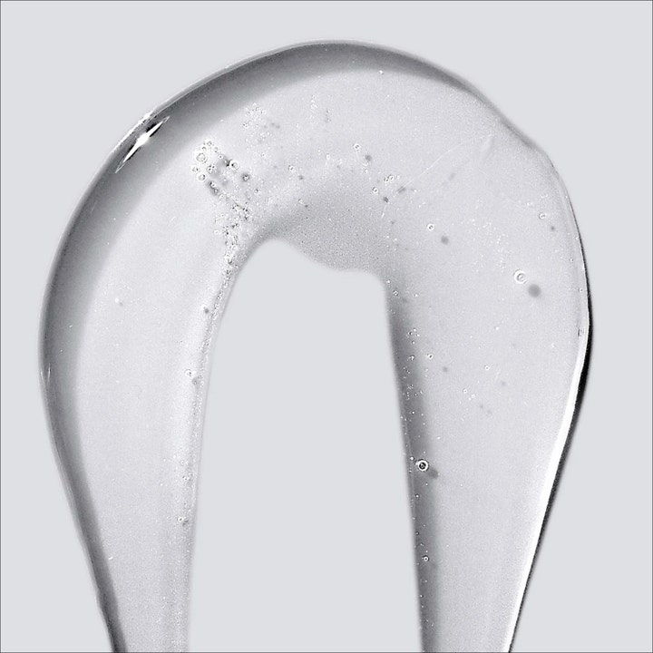 Dermalogica Conditioning Body Wash 295 ml pleiende dusjsåpe viser en klar og tykk geltekstur med små luftbobler