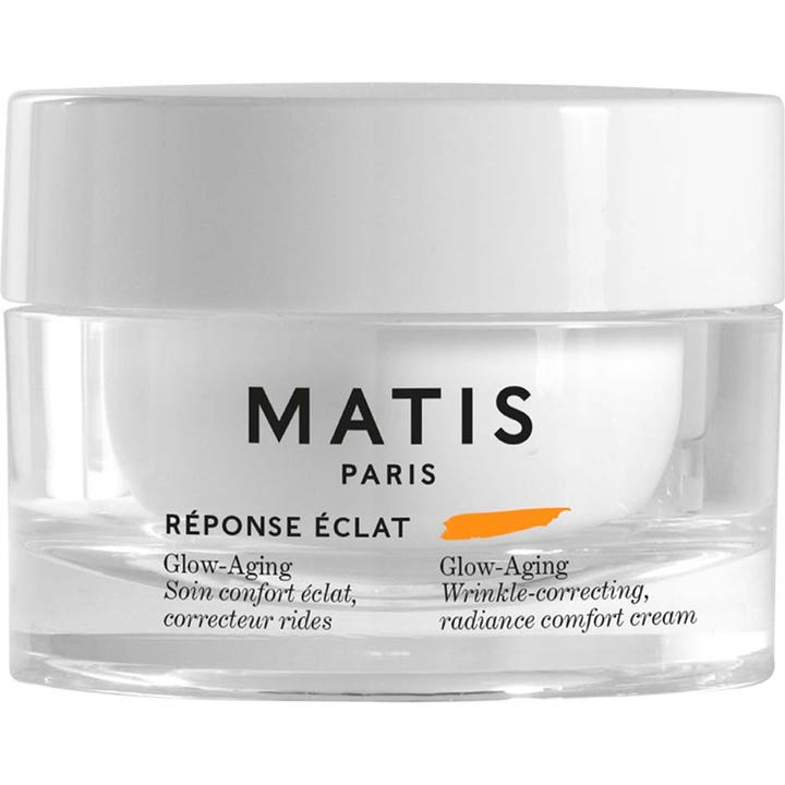 Matis Réponse Éclat Glow-Aging 50 ml rynkekorrigerende krem som gir glød i en gjennomsiktig glasskrukke med hvitt lokk.
