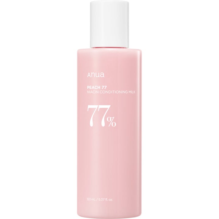 Anua Peach 77 Niacin Conditioning Milk 150 ml fuktighetskrem i lys rosa flaske med hvitt lokk