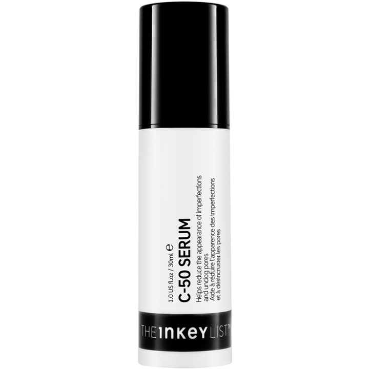 The INKEY List C-50 Serum 30ml som reduserer urenheter i en hvit sylindrisk flaske med svart pumpe og bunnfelt