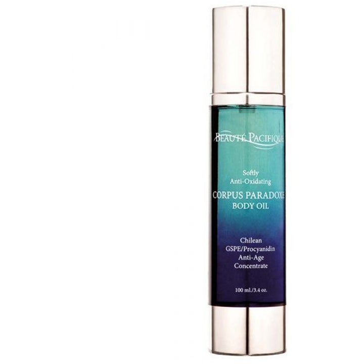 Beauté Pacifique Corpus Paradoxe Body Oil 100 ml anti-age kroppsolje i klar flaske med sølvkork og mørkeblått innhold.
