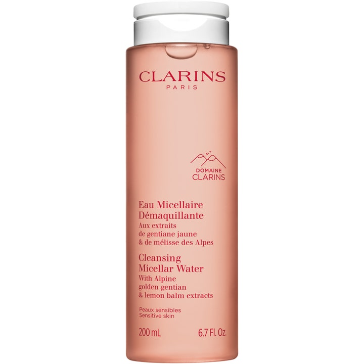 Clarins Cleansing Micellar Water 200 ml beroligende rens for sensitiv hud i en ferskenfarget gjennomsiktig plastflaske