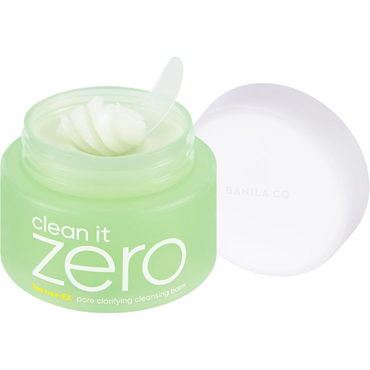 Banila Co Clean It Zero Cleansing Balm Pore Clarifying 100 ml ansiktsrens i grønn krukke med Tea tree-EX og spatel.