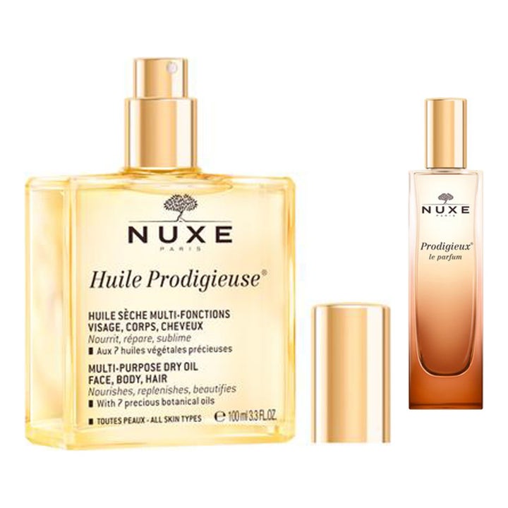 Nuxe Prodigieux le parfum og Huile Prodigieuse tørrolje i gylne glassflasker med gullkorker som gir huden glød.