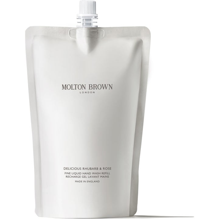 Molton Brown Delicious Rhubarb & Rose 400 ml håndsåpe refill i hvit plastpose med hvit skrukork.
