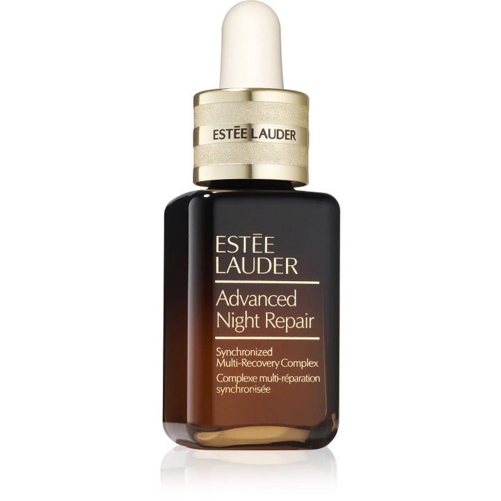 Estée Lauder Advanced Night Repair ansiktsserum som gir glød i ikonisk brun glassflaske med gullkork og pipette.