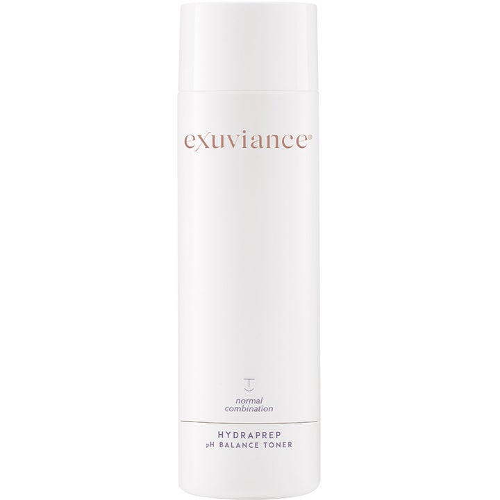 Exuviance HydraPrep pH Balance Toner 200 ml balanserer huden i en minimalistisk hvit flaske med rosegulldetaljer.