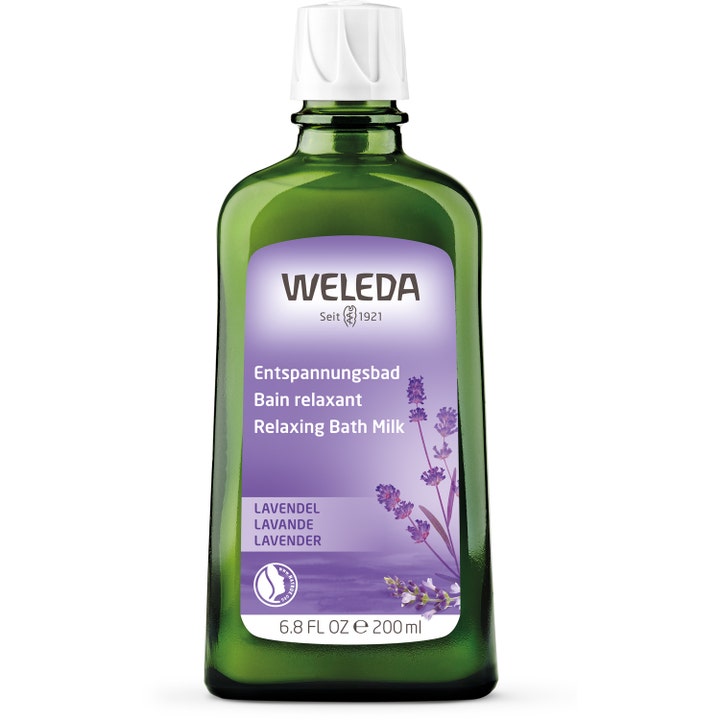 Weleda Lavender Relaxing Bath Milk 200 ml beroligende bademelk i en grønn glassflaske med hvit kork.