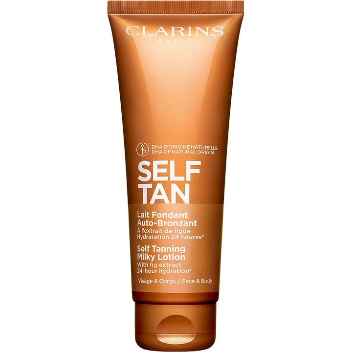 Clarins Self Tanning Milky Lotion 125 ml selvbruning gir glød i en bronsebrun tube med hvit tekst.