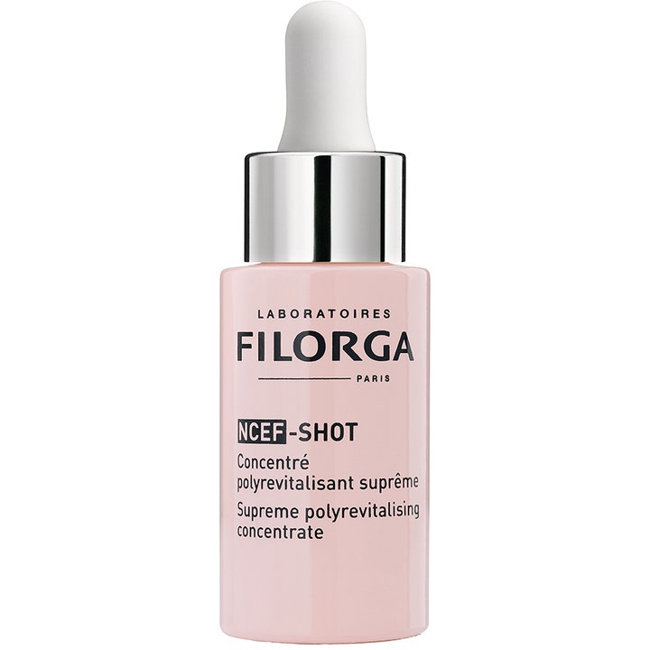 Filorga NCEF-SHOT 15 ml revitaliserende ansiktsserum i en lys rosa glassflaske med sølvdetaljer og hvit pipette.