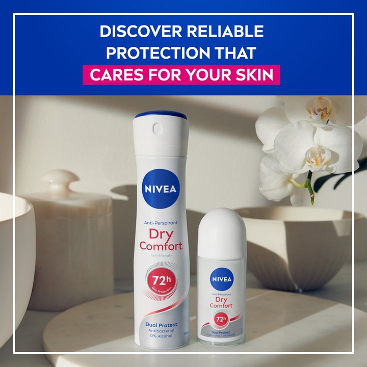 NIVEA Dry Comfort Roll On 25 ml pleiende deodorant ved siden av spray og hvite orkideer med 72h beskyttelse