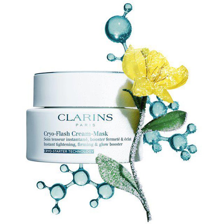 Clarins Cryo-Flash Cream-Mask 75 ml ansiktsmaske gir fasthet og glød i hvit krukke med rimfrost og gul blomst.