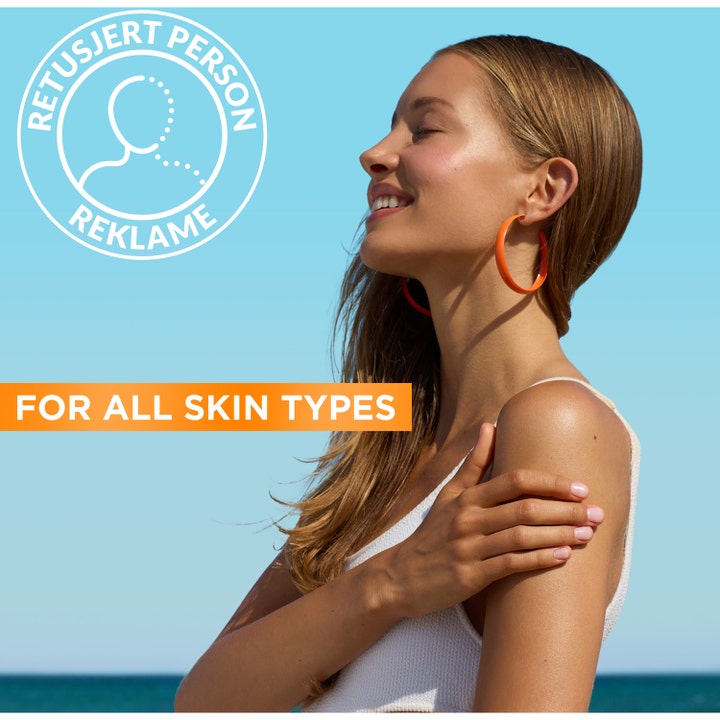 Garnier Ambre Solaire Hydra 24H Protect 175 ml solkrem spf 30 på kvinne med glødende hud for alle hudtyper