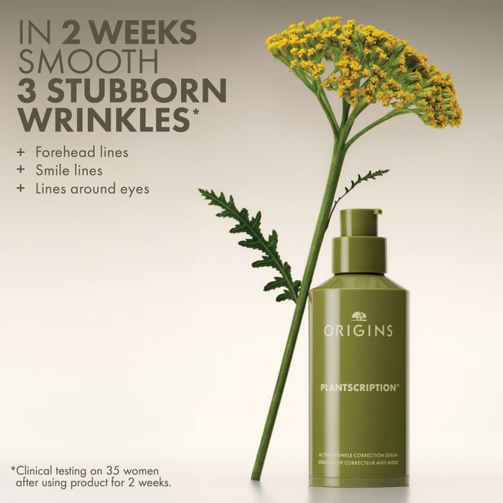 Origins Plantscription Active Wrinkle Correction Serum 48 ml mot rynker i grønn pumpeflaske ved en gul blomst.