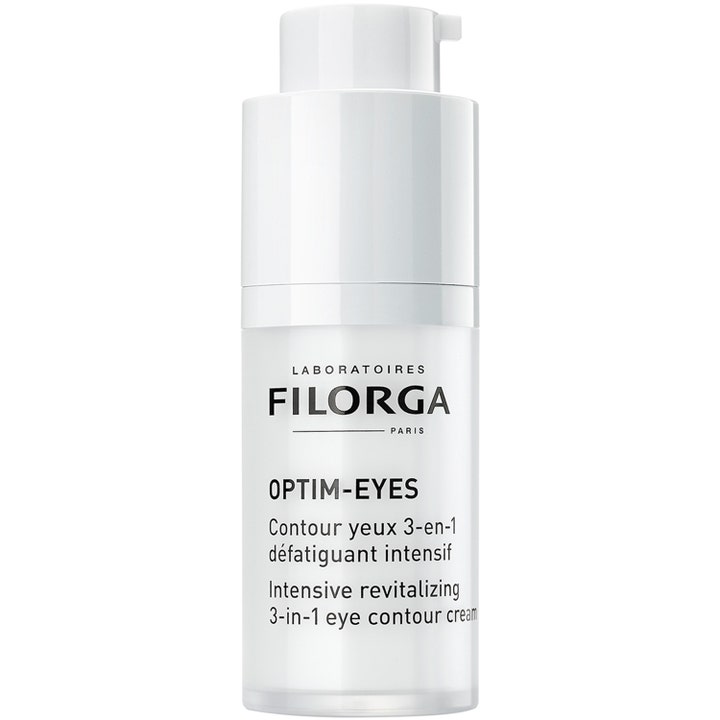 Filorga Optim-Eyes 3-in-1 Eye Contour Cream 15 ml øyekrem mot mørke ringer i en hvit sylindrisk pumpeflaske