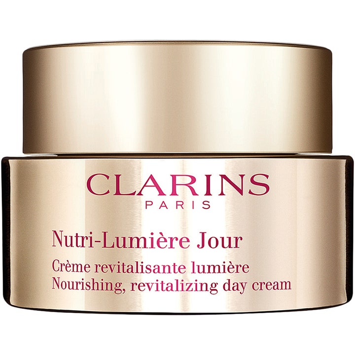 Clarins Nutri-Lumière Jour 50 ml revitaliserende dagkrem i en luksuriøs og skinnende gullfarget krukke