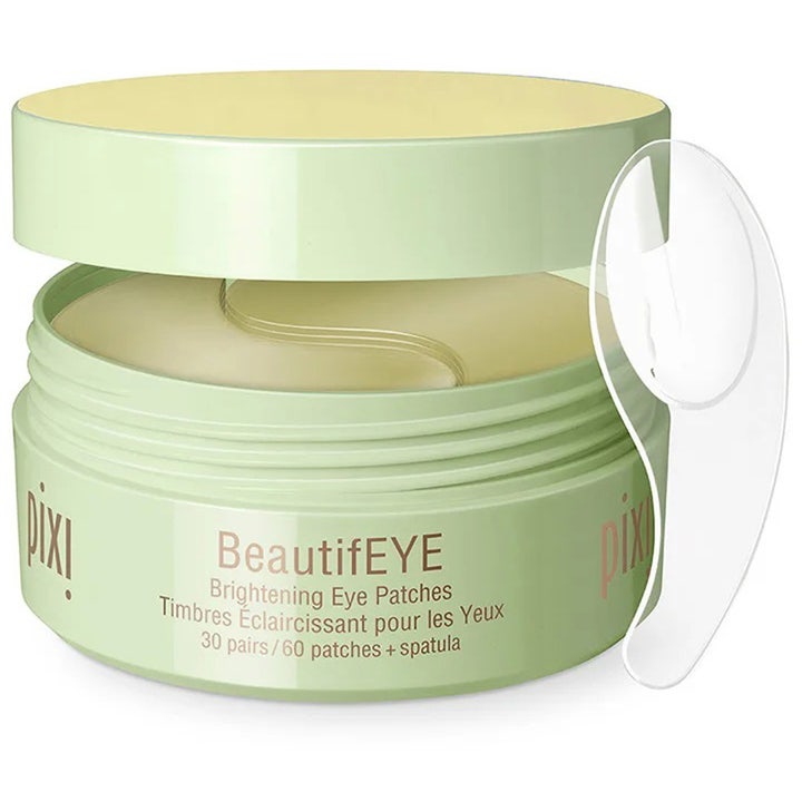 Pixi BeautifEYE Brightening Eye Patches 30 par lysnende øyemasker i en lysegrønn krukke med gjennomsiktig spatel